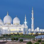 View of famous Abu Dhabi Sheikh Zayed Mosque by night, UAE.